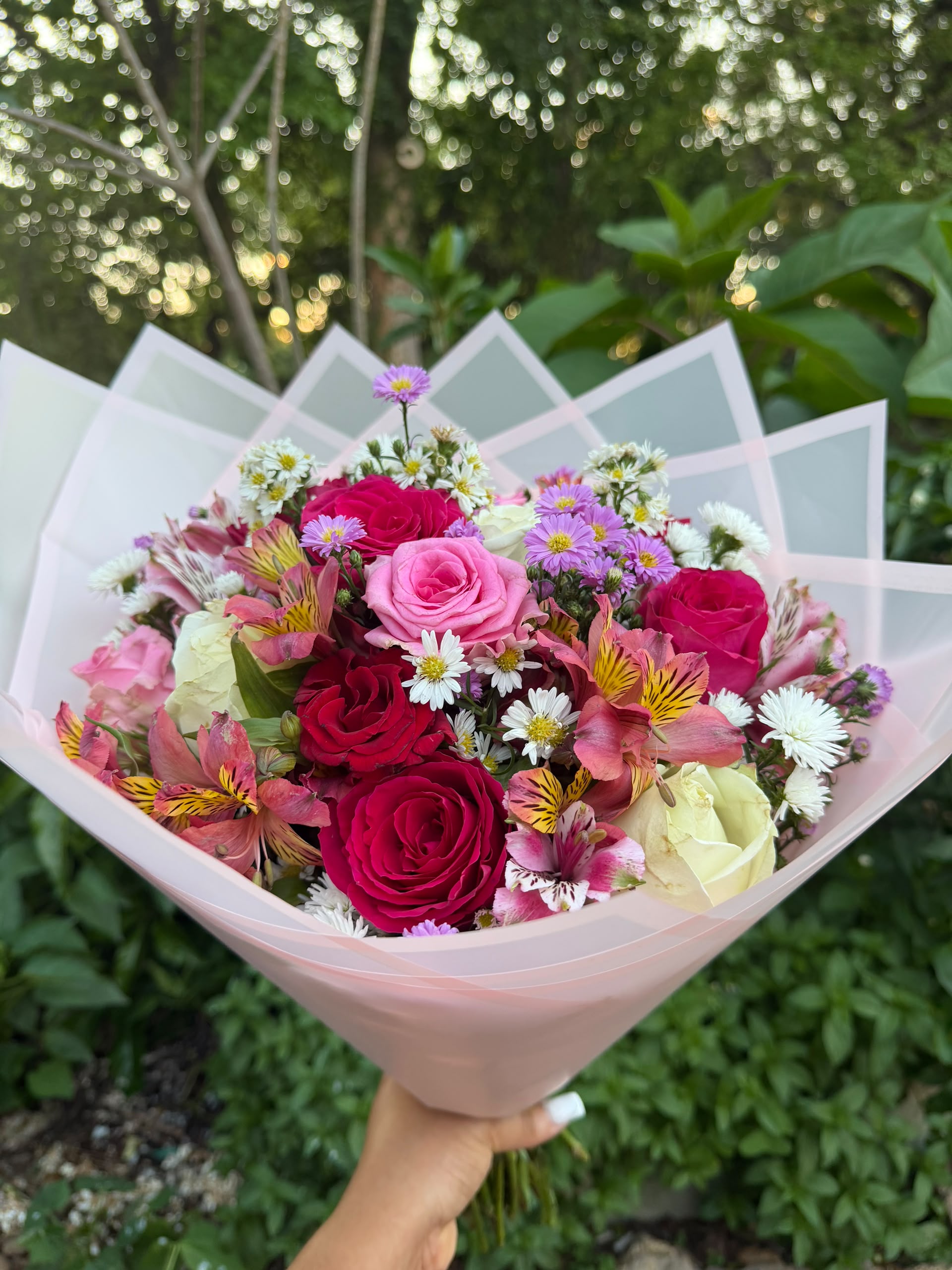Colourful mixed rose and alstroemeria bouquet