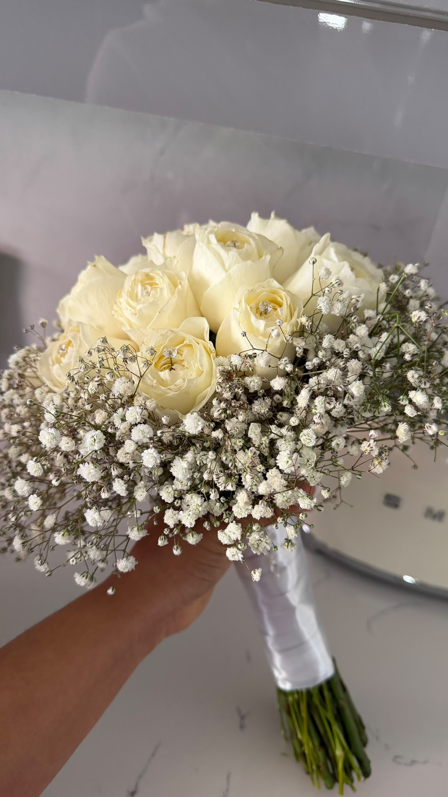 Autumn-toned chrysanthemum bouquet in black wrap