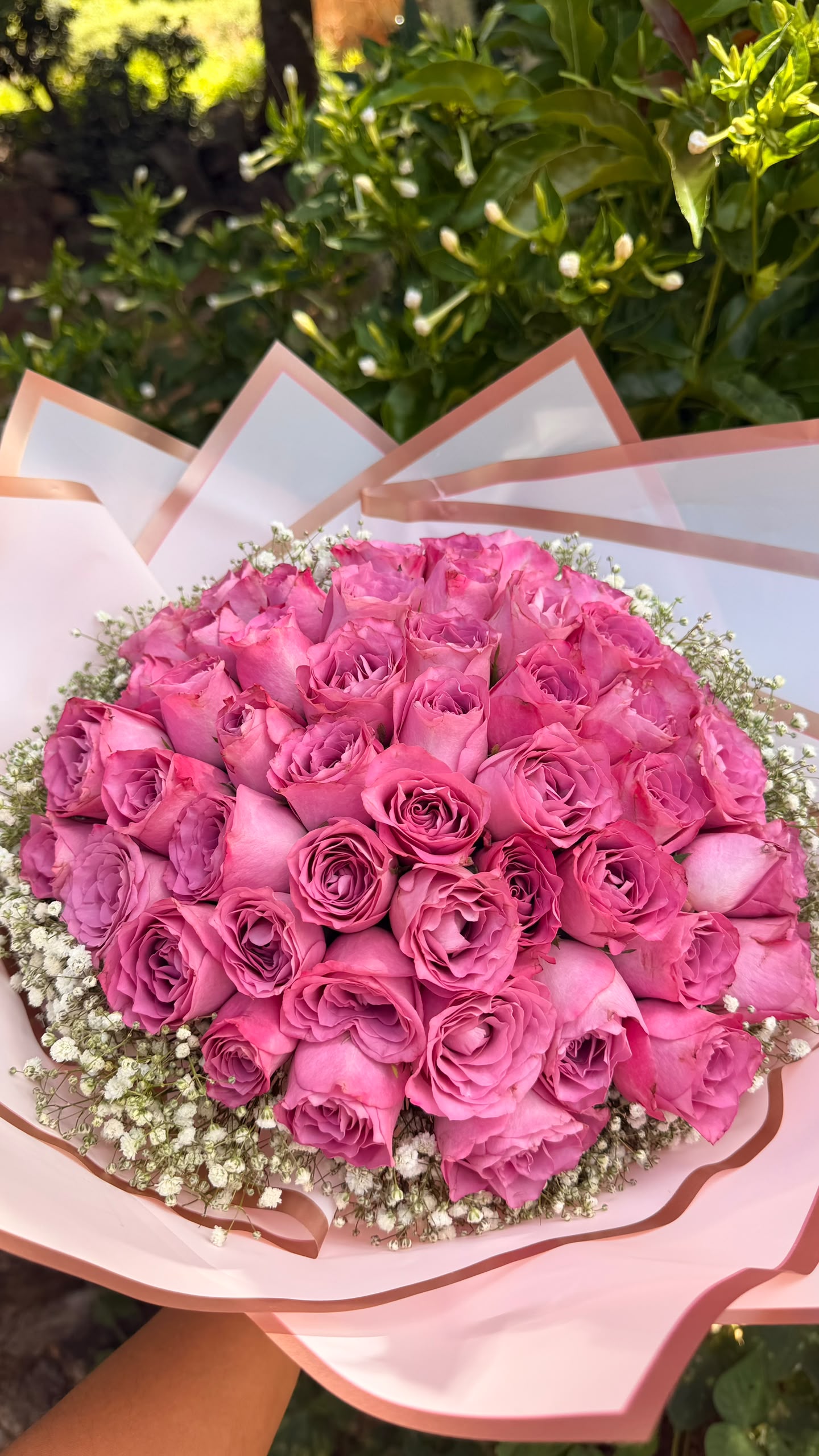 Heart-shaped gift box with red roses and Ferrero Rocher chocolates